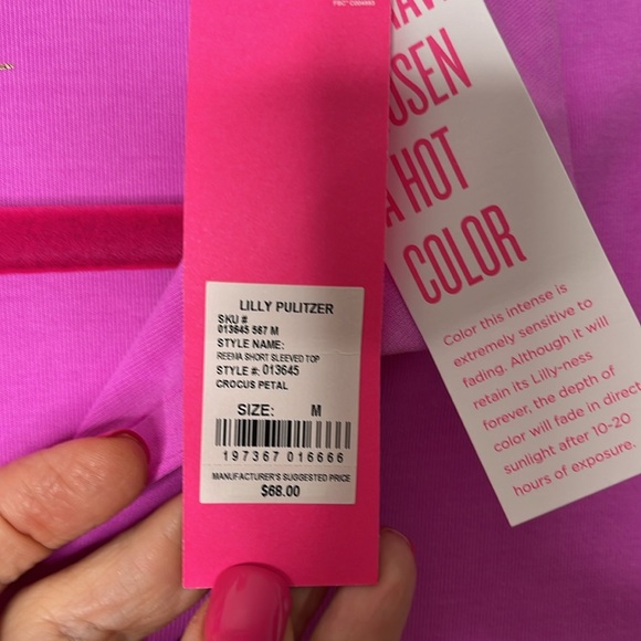 Lilly Pulitzer Reema Short Sleeved Polo Top in color Crocus Petal, size Medium - Picture 10 of 13